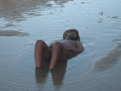 Man lying in water
